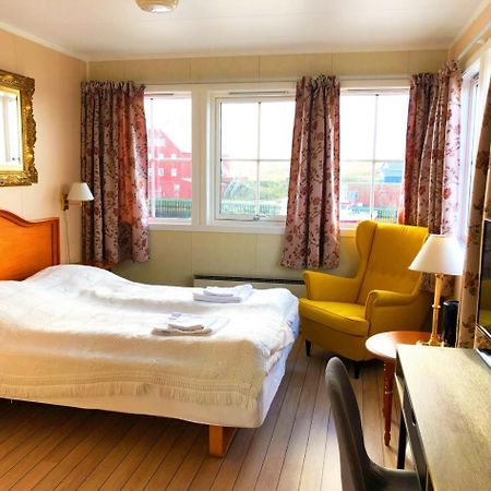 Rost Bryggehotell Bagian luar foto